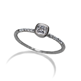 Fine platinum cushion shaped diamond ring