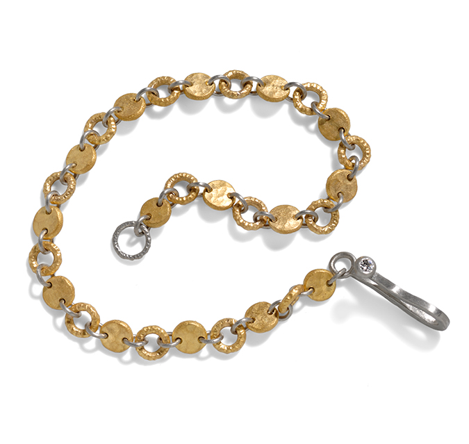 18ct gold and platinum hammered disc bracelet