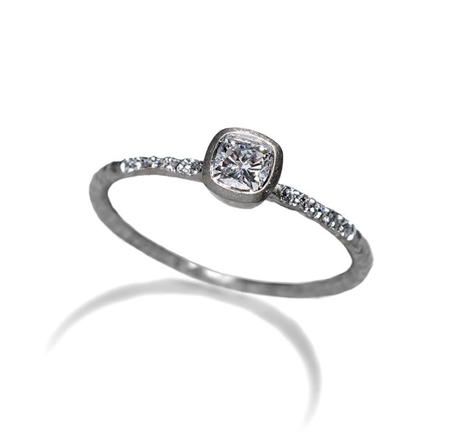 Fine platinum cushion shaped diamond ring